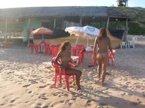Two sexy ebony chicks were shot naked on the beach bar.