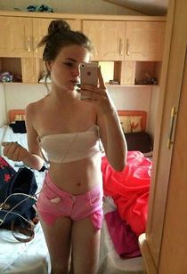 Young babe makes selfie, several amateur photos made for facebook