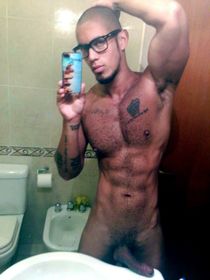 Naked black men photographing himself on mobile phones