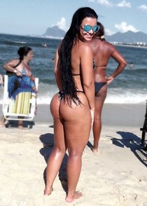 American girl on beach in bikini have amazing body and great big ass