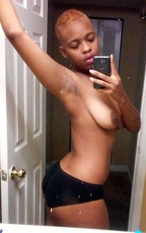 Afro-american mom takes self-pics topless