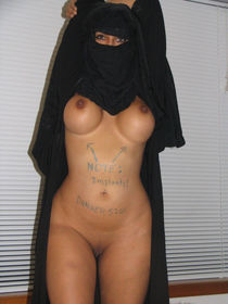 Arab Chick With AK-47 Stripping Out Of Her Burka And Showing