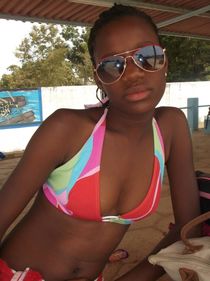 African teens chilling by the pool - Puganda