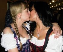 People & Humanity - Oktoberfest girls kissing, Munich, Bavar