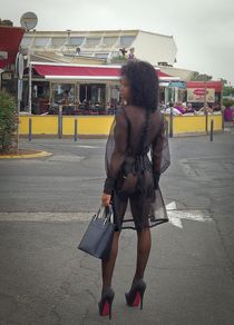Public nudity photos from French, charming ebony babe in the street