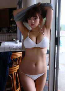 Busty asian model Ai Shinozaki posing in the water