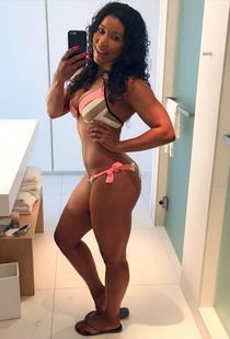 Leggy beauty in a narrow bikini posing in front of a mirror. I want to fuck this teen