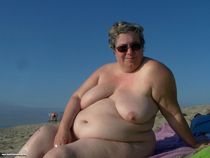 Fully naked mature BBW exposing their fat folds