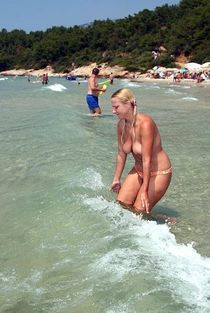 Busty mature women nudists in the sea