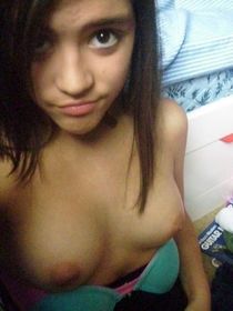 Young schoolgirls with small titties takes self-shot pictures being naked