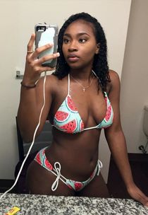 Black girlfriend takes sexy shots in front of mirror
