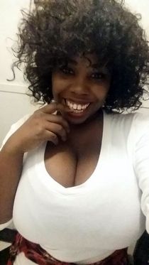 Charming ebony girls with wide cleavages take sexy selfies